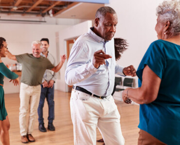 People Attending Dance Class In Community Center